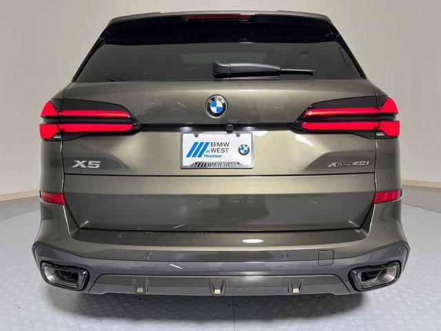 Photo of 2026 Manhattan Green Metallic BMW X5