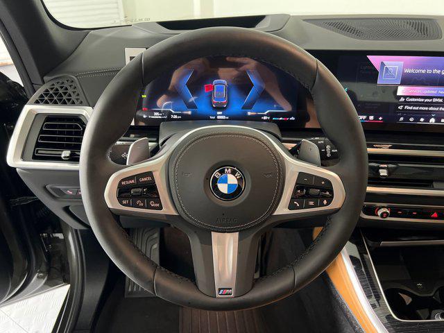Photo of 2026 Manhattan Green Metallic BMW X5