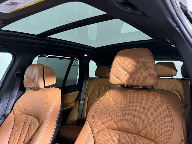 Photo of 2026 Manhattan Green Metallic BMW X5