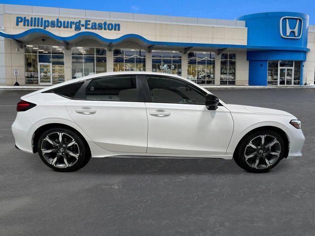 Photo of 2026 Platinum White Pearl Honda Civic Hybrid
