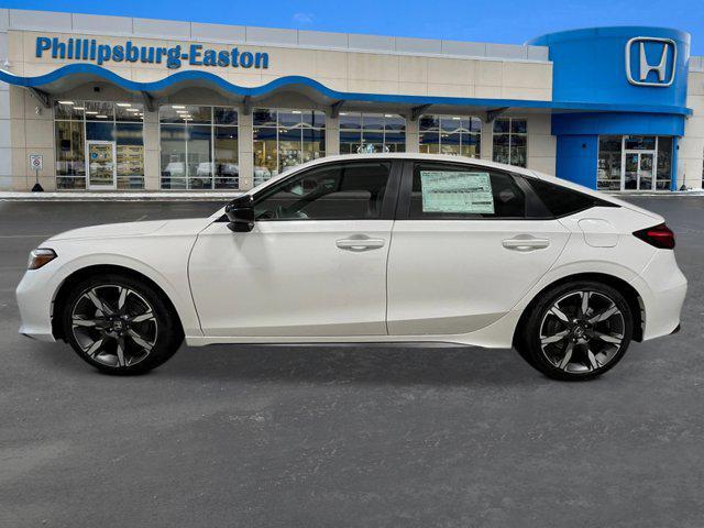 Photo of 2026 Platinum White Pearl Honda Civic Hybrid