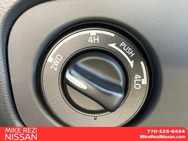 Photo of 2025 Glacier White Nissan Frontier