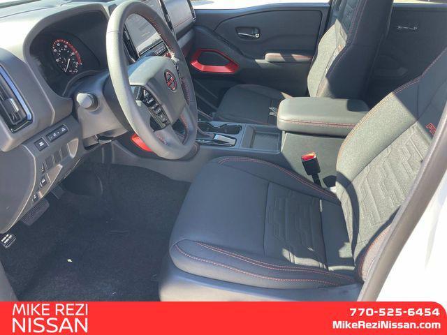 Photo of 2025 Glacier White Nissan Frontier