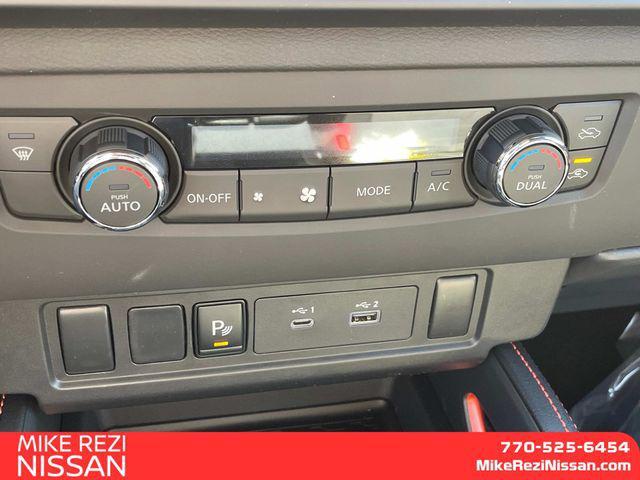 Photo of 2025 Glacier White Nissan Frontier