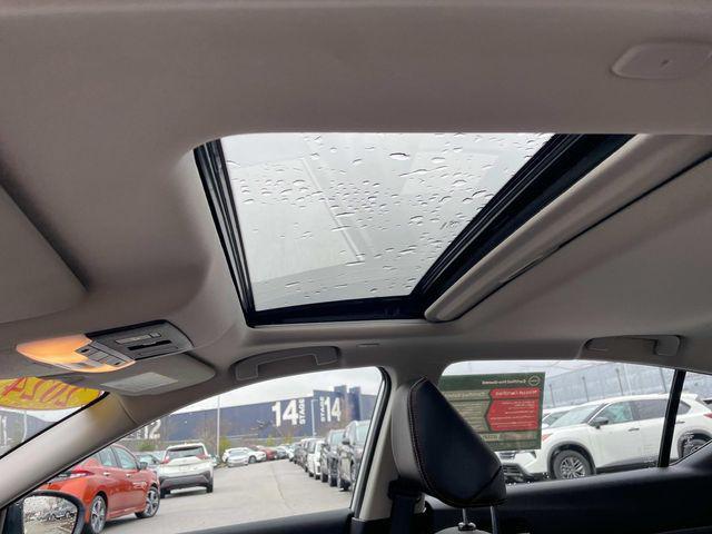 Photo of 2024 Pearl White Tricoat Nissan Altima