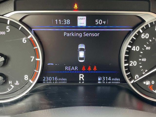 Photo of 2024 Pearl White Tricoat Nissan Altima