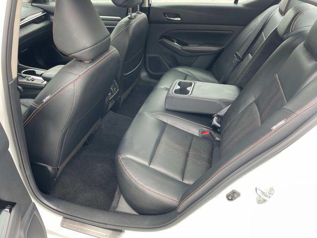Photo of 2024 Pearl White Tricoat Nissan Altima
