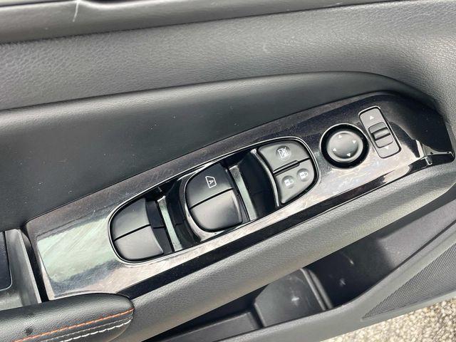 Photo of 2024 Pearl White Tricoat Nissan Altima