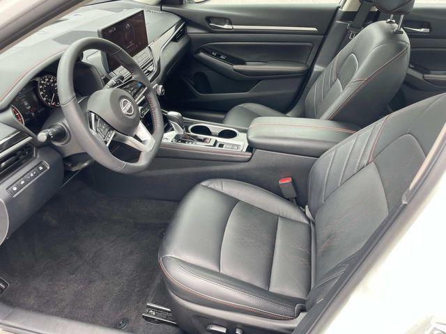 Photo of 2024 Pearl White Tricoat Nissan Altima