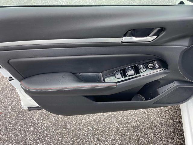 Photo of 2024 Pearl White Tricoat Nissan Altima