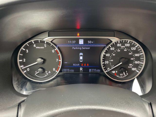 Photo of 2024 Pearl White Tricoat Nissan Altima