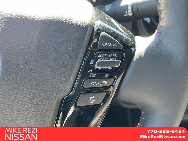 Photo of 2025 Glacier White Nissan Frontier
