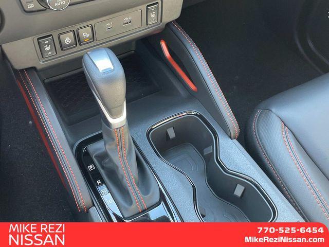 Photo of 2025 Glacier White Nissan Frontier
