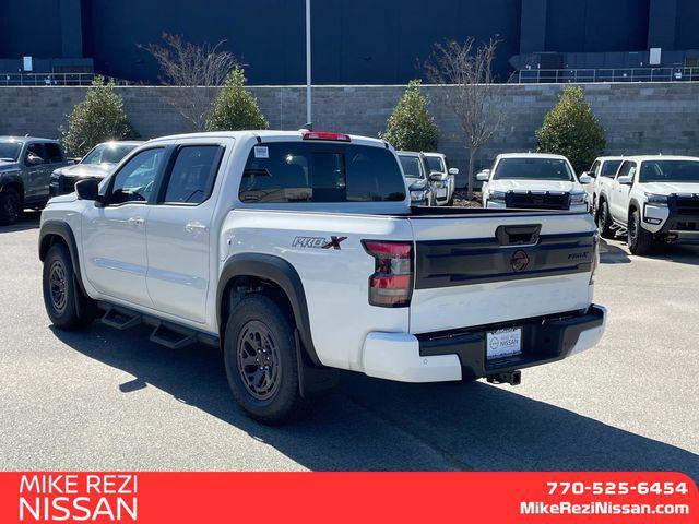 Photo of 2025 Glacier White Nissan Frontier
