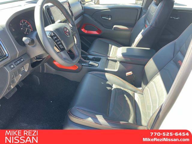 Photo of 2025 Glacier White Nissan Frontier