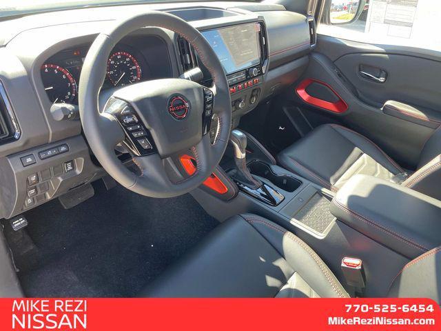Photo of 2025 Glacier White Nissan Frontier
