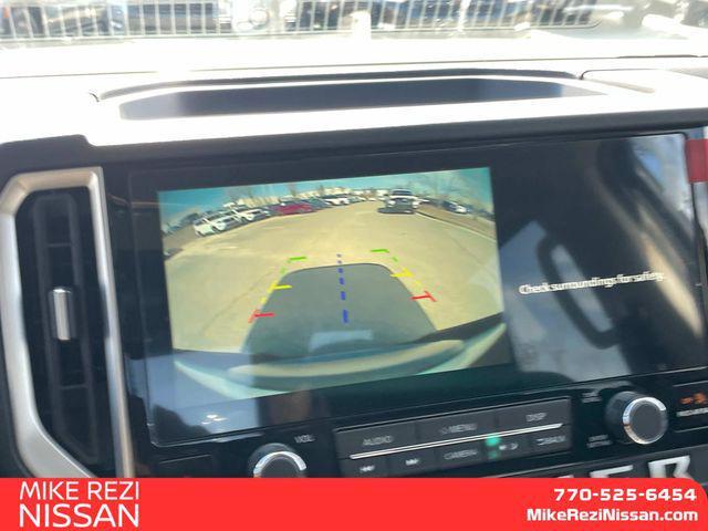 Photo of 2025 Glacier White Nissan Frontier