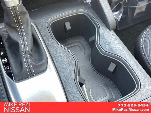 Photo of 2025 Glacier White Nissan Frontier