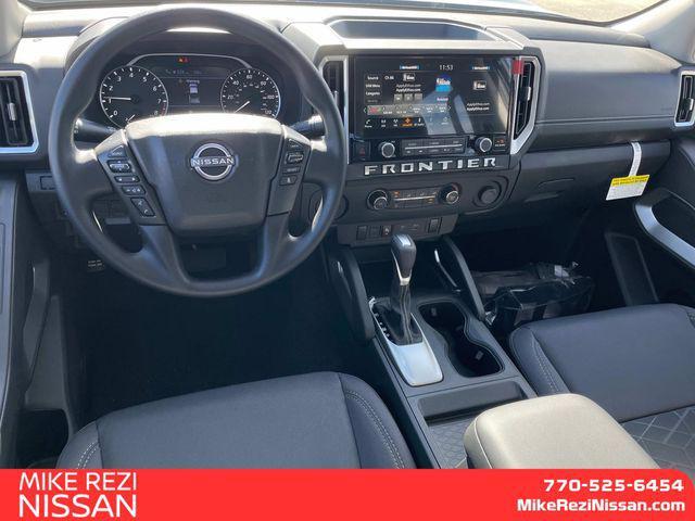 Photo of 2025 Glacier White Nissan Frontier