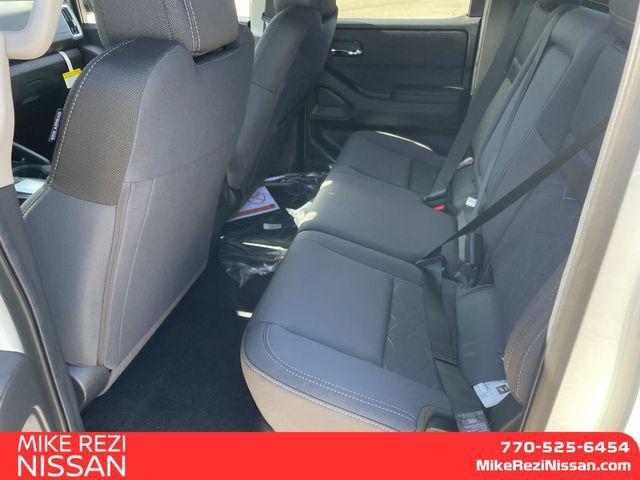 Photo of 2025 Glacier White Nissan Frontier