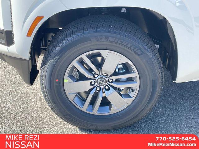 Photo of 2025 Glacier White Nissan Frontier