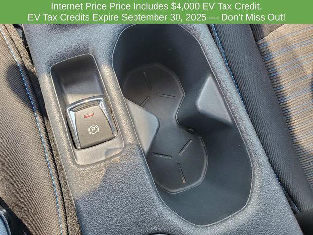 Photo of 2023 Scarlet Ember Tintcoat Nissan Leaf