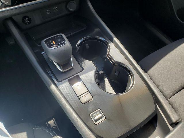 Photo of 2024 Glacier White Nissan Rogue