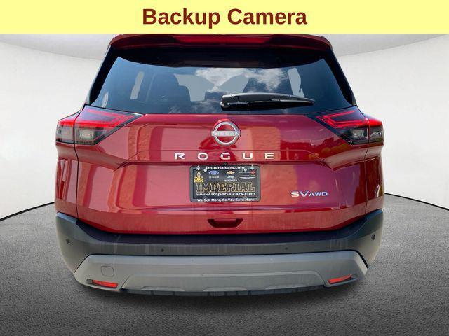 Photo of 2023 Scarlet Ember Tintcoat Nissan Rogue
