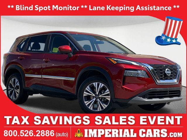 Photo of 2023 Scarlet Ember Tintcoat Nissan Rogue