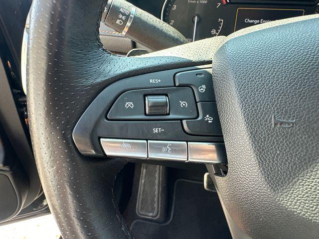 Photo of 2023 Stellar Black Metallic Cadillac XT4