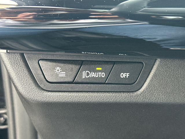 Photo of 2024 Black Sapphire Metallic BMW X1