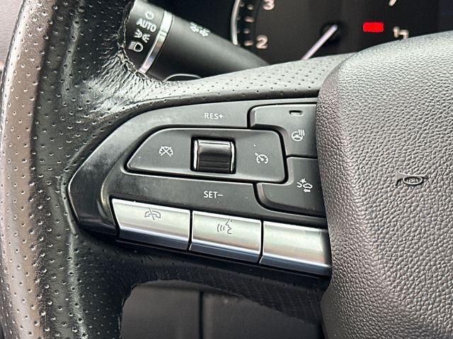 Photo of 2023 Crystal White Tricoat Cadillac XT4