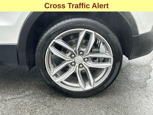 Photo of 2023 Crystal White Tricoat Cadillac XT4