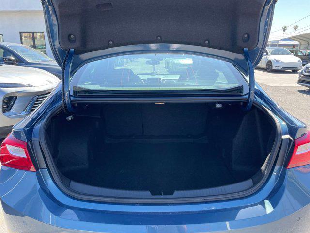 Photo of 2024 Lakeshore Blue Metallic Chevrolet Malibu
