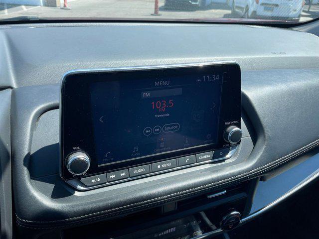 Photo of 2024 Scarlet Ember Tintcoat Nissan Rogue