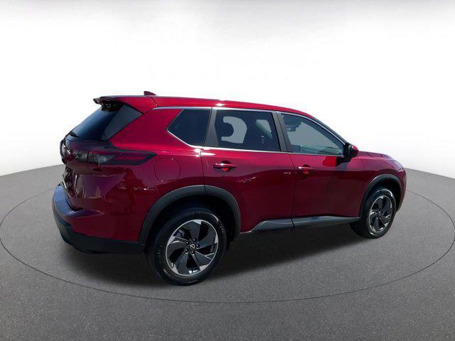 Photo of 2024 Scarlet Ember Tintcoat Nissan Rogue