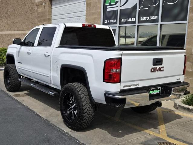 Photo of 2016 White GMC Sierra 1500