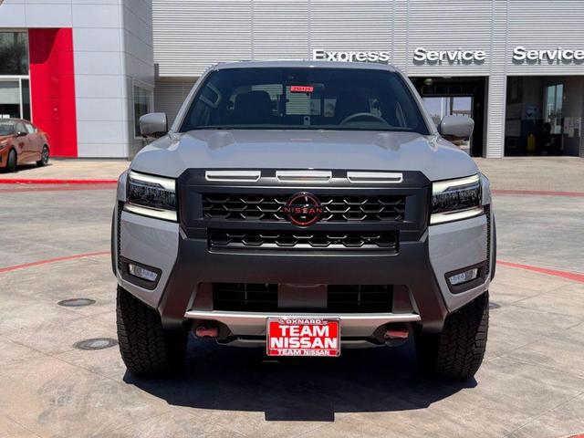 Photo of 2025 Boulder Gray Pearl Nissan Frontier