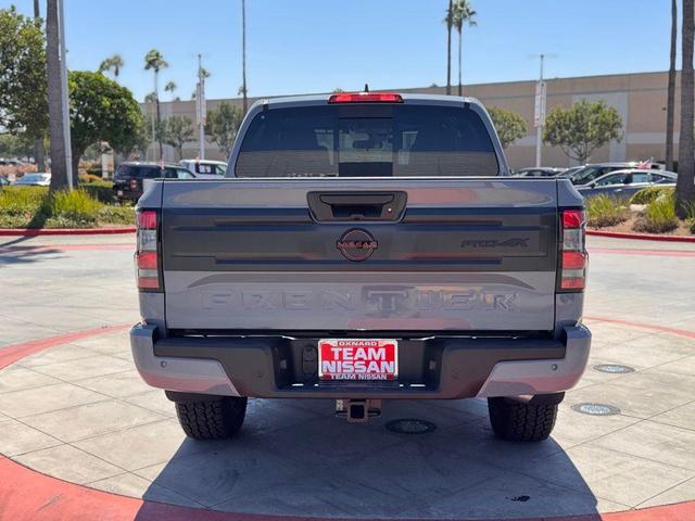 Photo of 2025 Boulder Gray Pearl Nissan Frontier