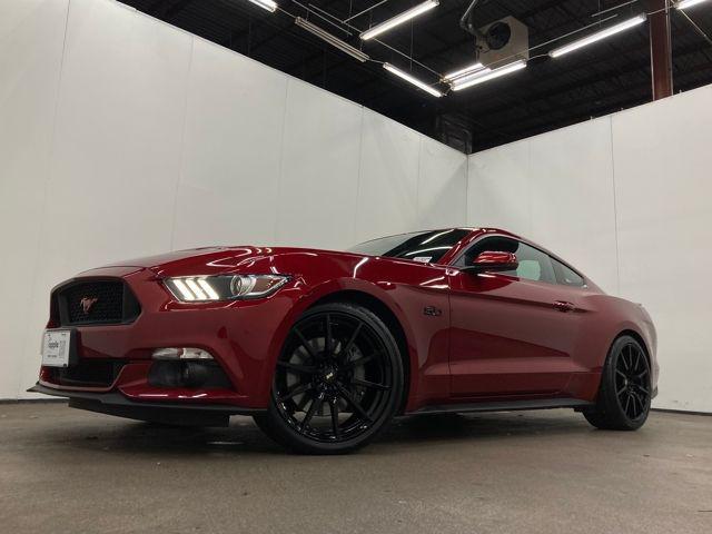 Photo of 2017 Ruby Red Metallic Tinted Clearcoat Ford Mustang