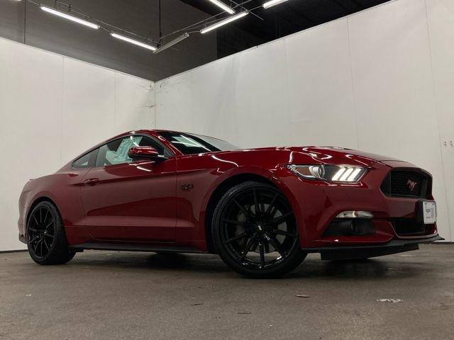 Photo of 2017 Ruby Red Metallic Tinted Clearcoat Ford Mustang
