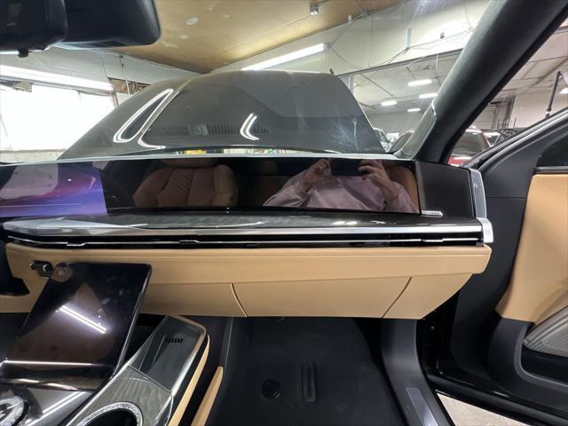 Photo of 2025 Black Raven Cadillac Escalade IQ