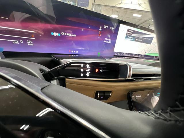 Photo of 2025 Black Raven Cadillac Escalade IQ