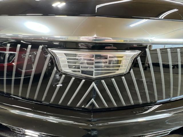 Photo of 2025 Black Raven Cadillac Escalade IQ