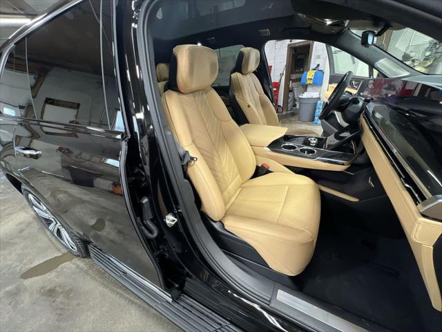Photo of 2025 Black Raven Cadillac Escalade IQ