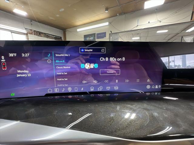 Photo of 2025 Black Raven Cadillac Escalade IQ