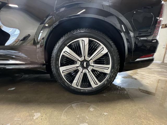 Photo of 2025 Black Raven Cadillac Escalade IQ
