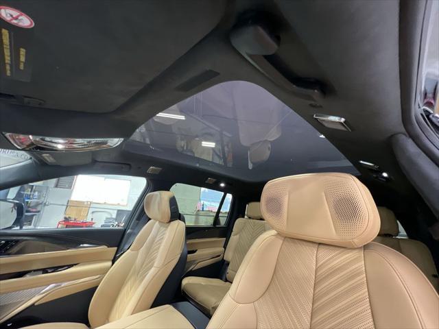 Photo of 2025 Black Raven Cadillac Escalade IQ