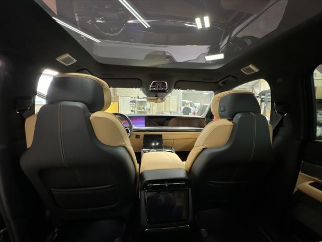 Photo of 2025 Black Raven Cadillac Escalade IQ