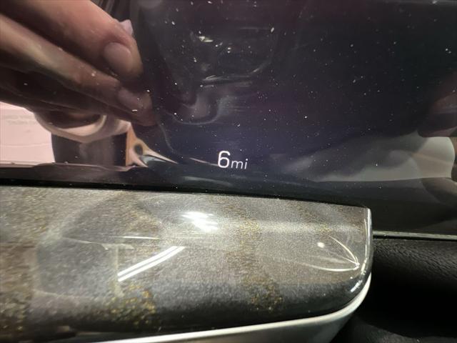 Photo of 2025 Black Raven Cadillac Escalade IQ